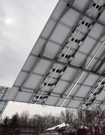 Tip tilt dual axis tracker array for solar panels in winter